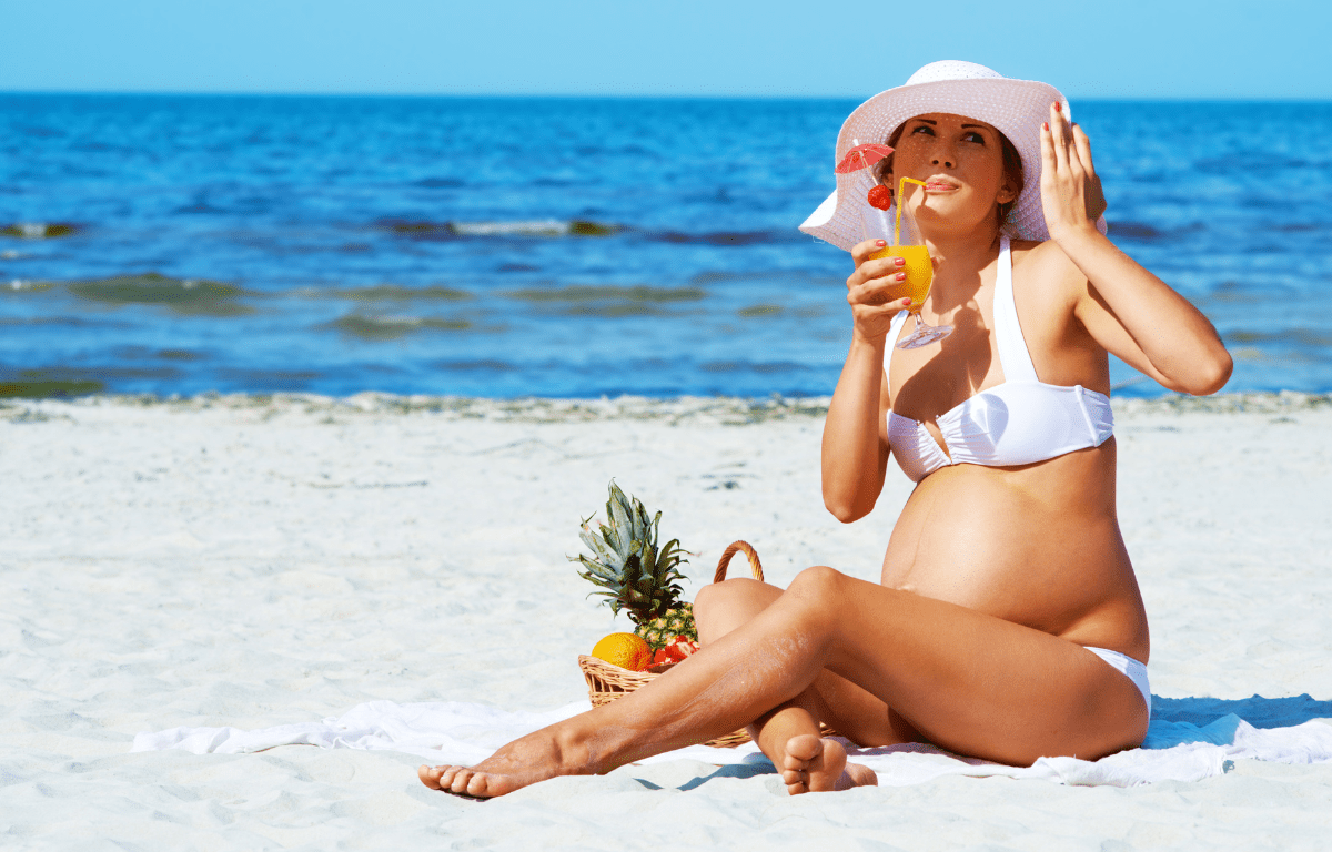 Pregnant women enjoying sun with pregnancy-safe skincare routine