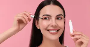 Pregnant women happily using a safe lash serum