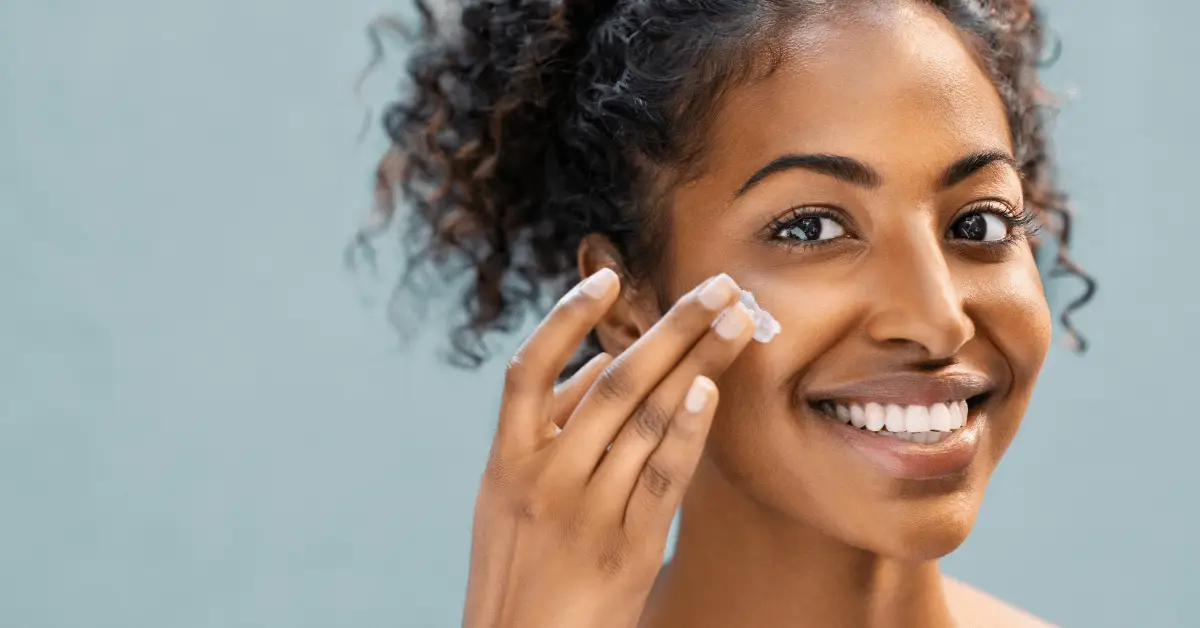 Woman applying a pregnancy safe moisturizer