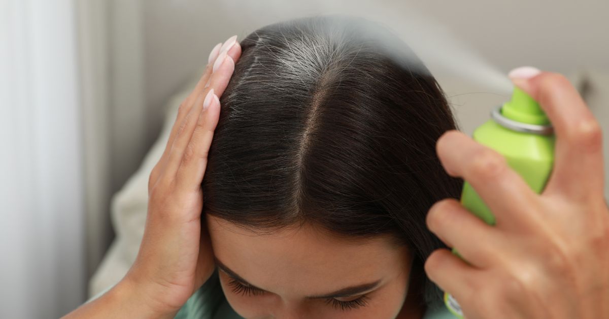 Pregnant Woman Using Pregnancy Safe Dry Shampoo