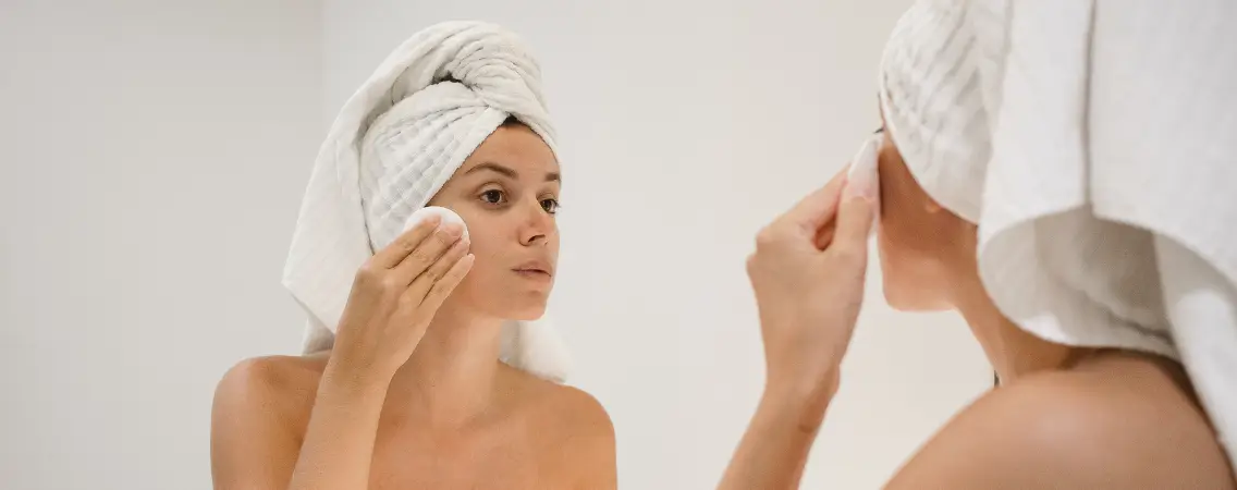 Pregnant women treating her acne
