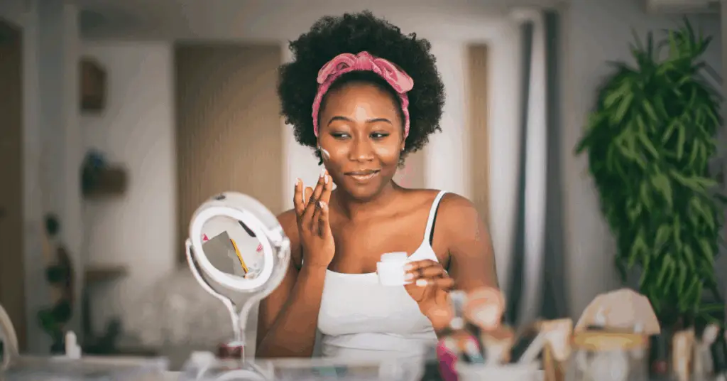 Women using a cream to treat her pregnancy acne